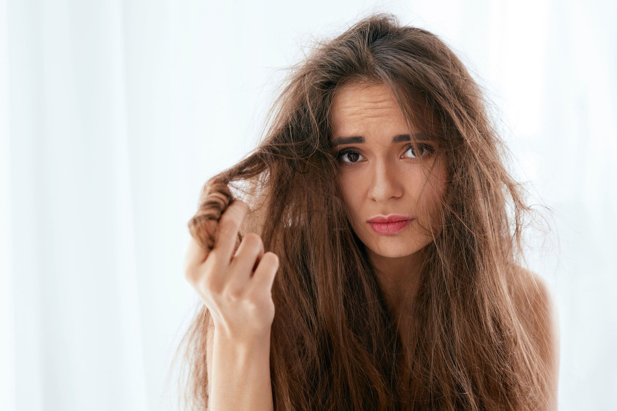 Woman with dry frizzy hair