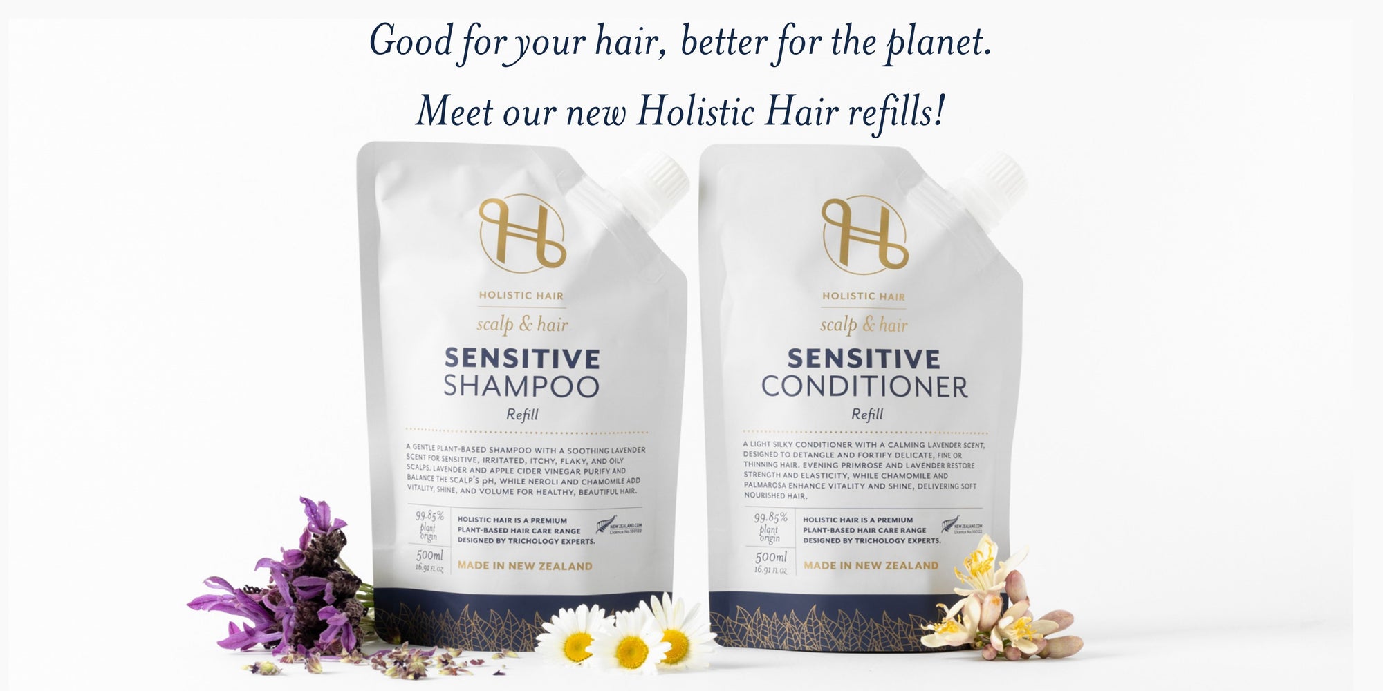 Two Holistic Hair refills for sensitive skin, one with shampoo and one with conditioner, on a white background.