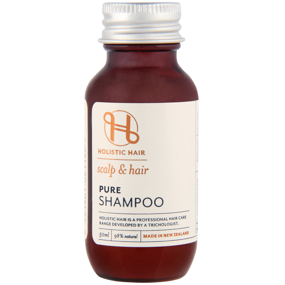 Pure Shampoo bottle with a natural formula featuring manuka honey and aloe vera, fragrance-free.