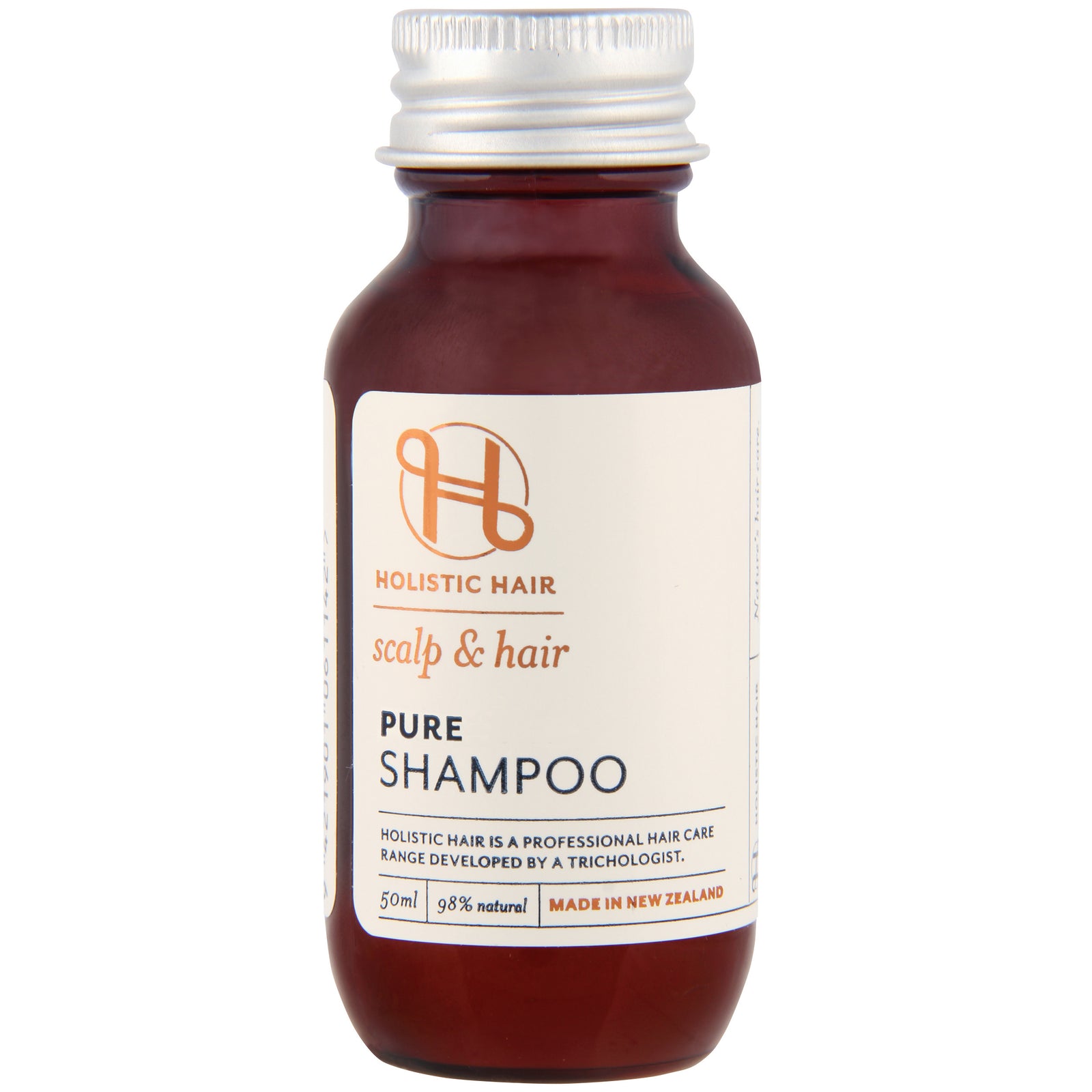 Pure Shampoo bottle with a natural formula featuring manuka honey and aloe vera, fragrance-free.