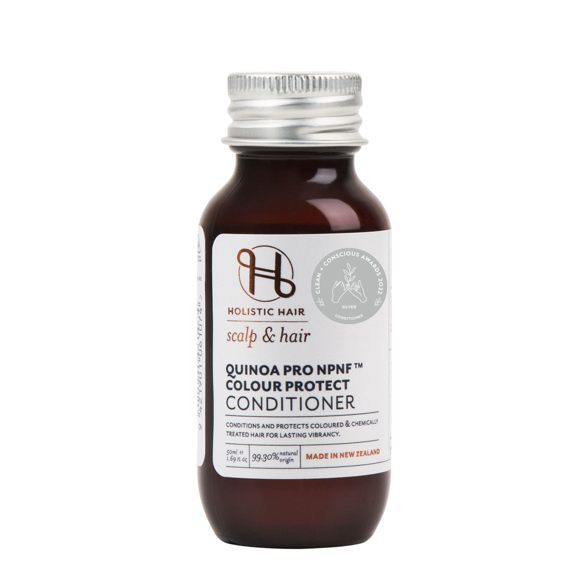 Bottle of Quinoa Pro NPNF™ Colour Protect Conditioner surrounded by natural ingredients like Murumuru butter, flax, and mango.
