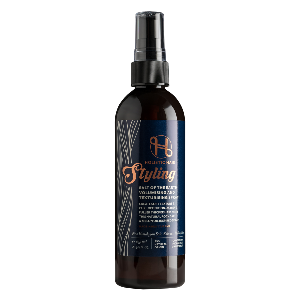 Bottle of Pink Himalayan Salt Spray surrounded by Kalahari melon and Himalayan salt crystals, symbolizing texture and hydration.